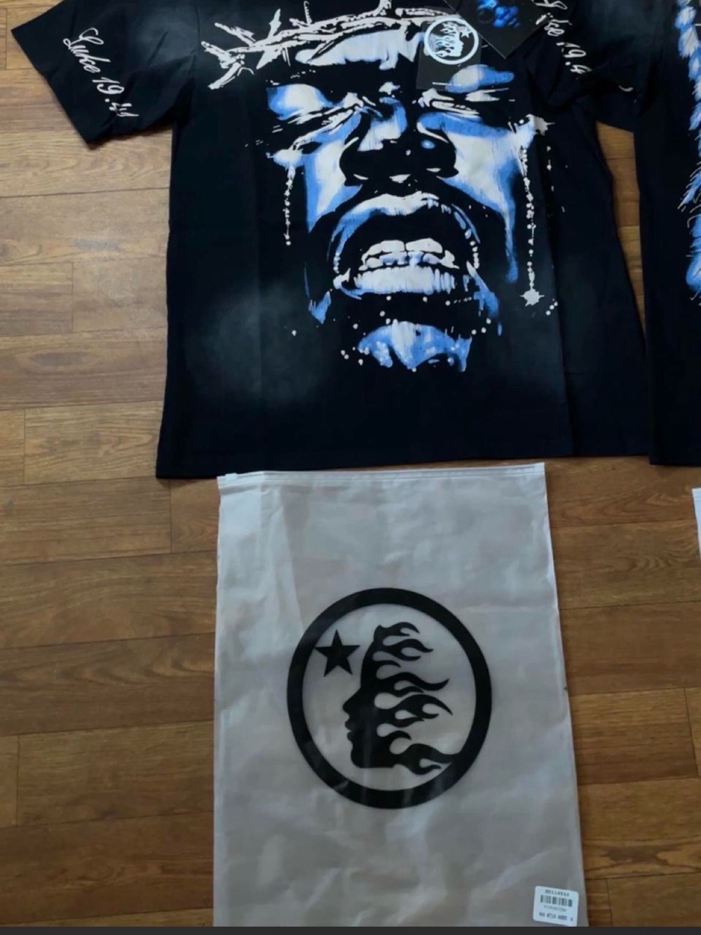 Black Short-Sleeve Graphic Tee with Blue Face Print
